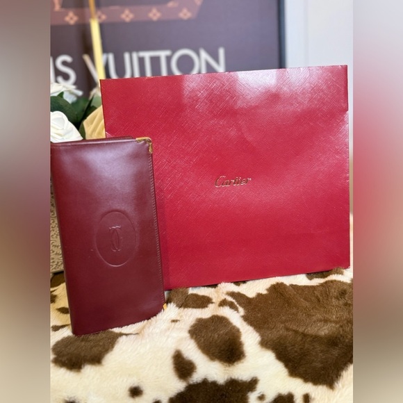 Cartier Handbags - CARTIER Must de Cartier Bordeaux Long Burgundy Leather Wallet - GUC COA